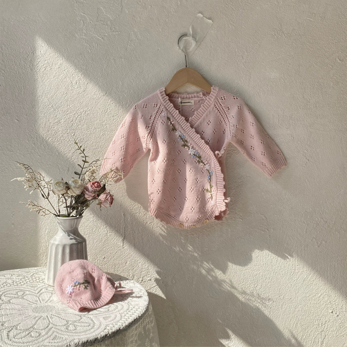 Pink Eyelet V-Neck Onesie