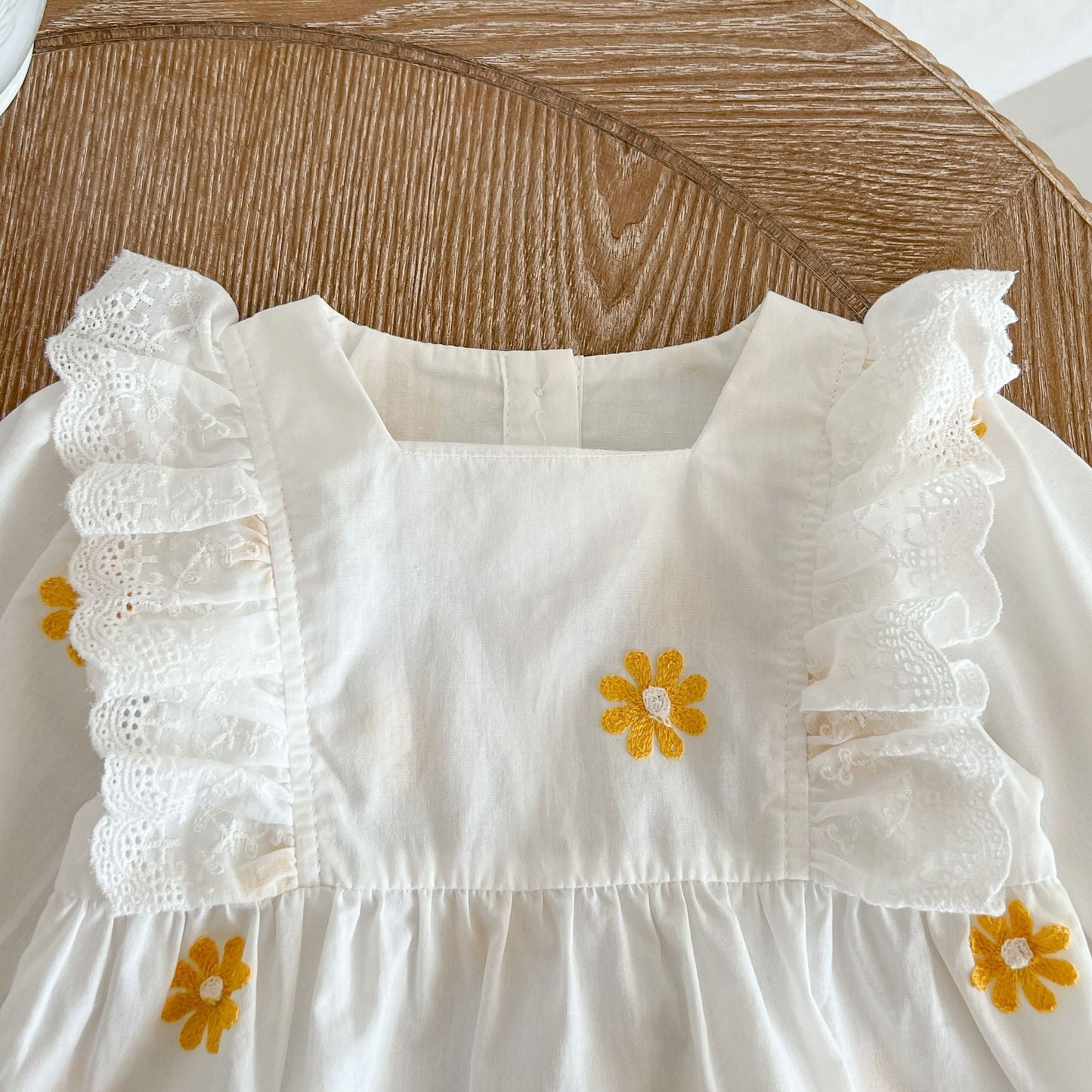 Floral Embroidered Ruffle Onesie