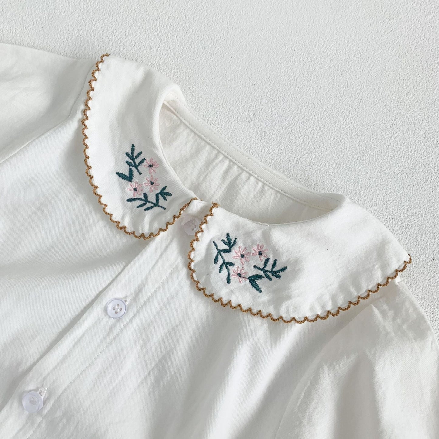 Embroidered Lapel Collar Onesie