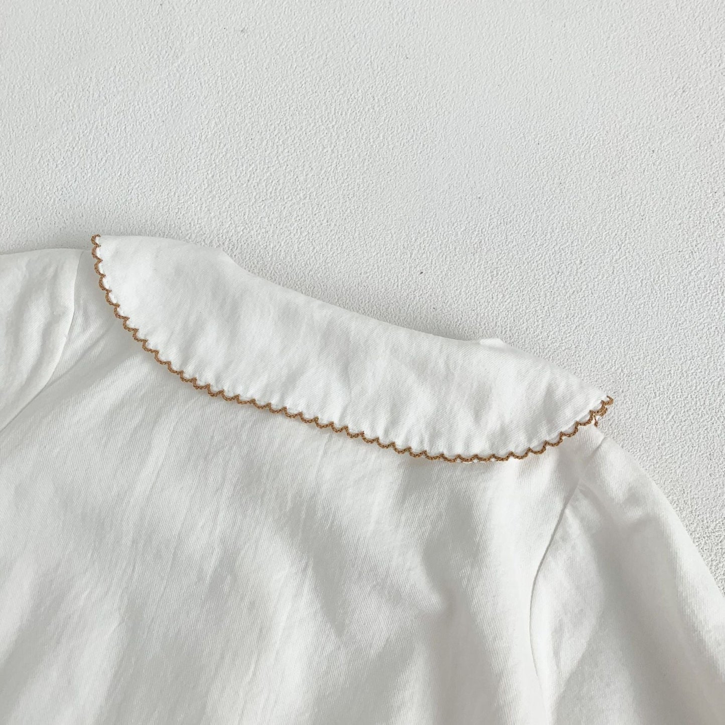 Embroidered Lapel Collar Onesie