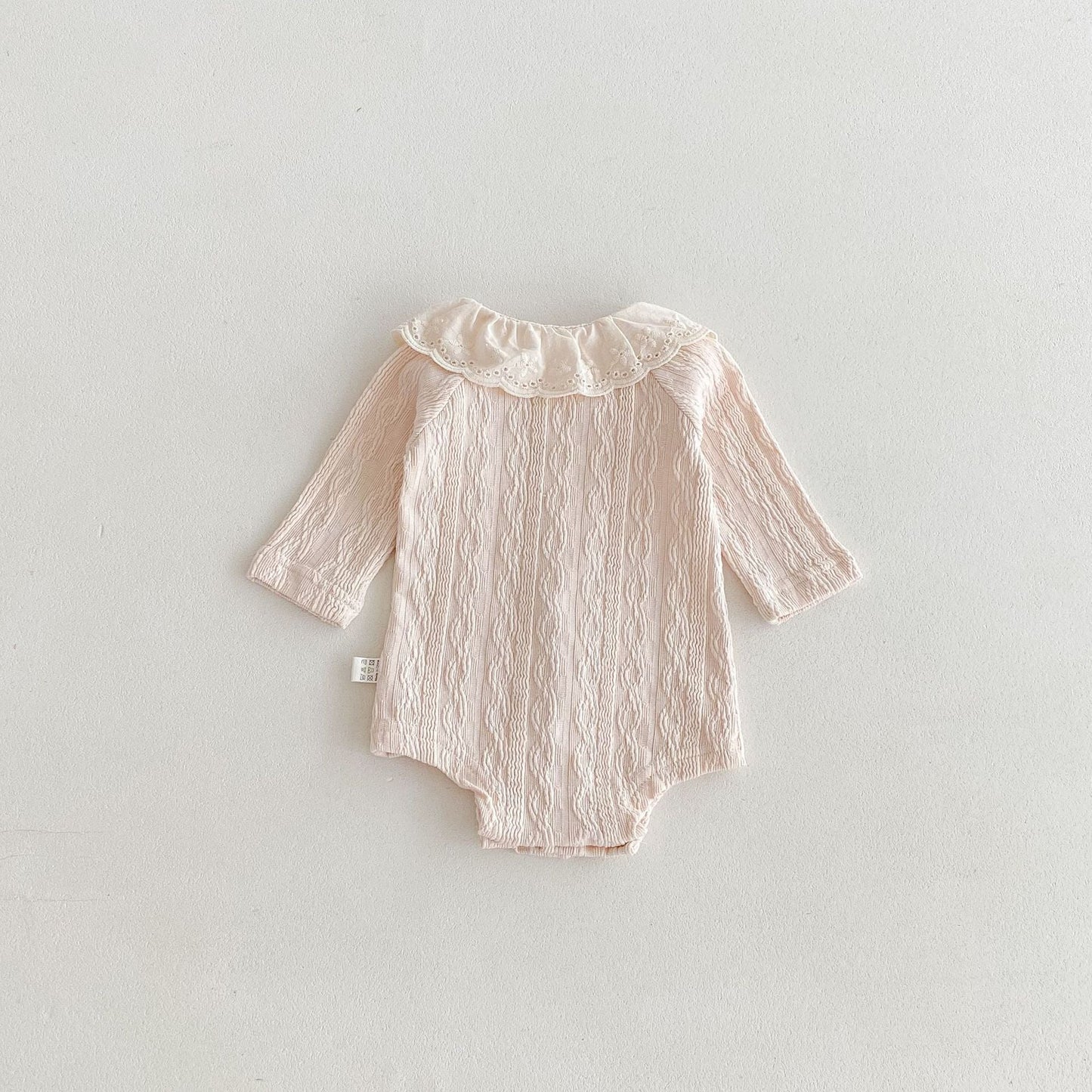 Pañalero de manga larga con estampado de rayas finas