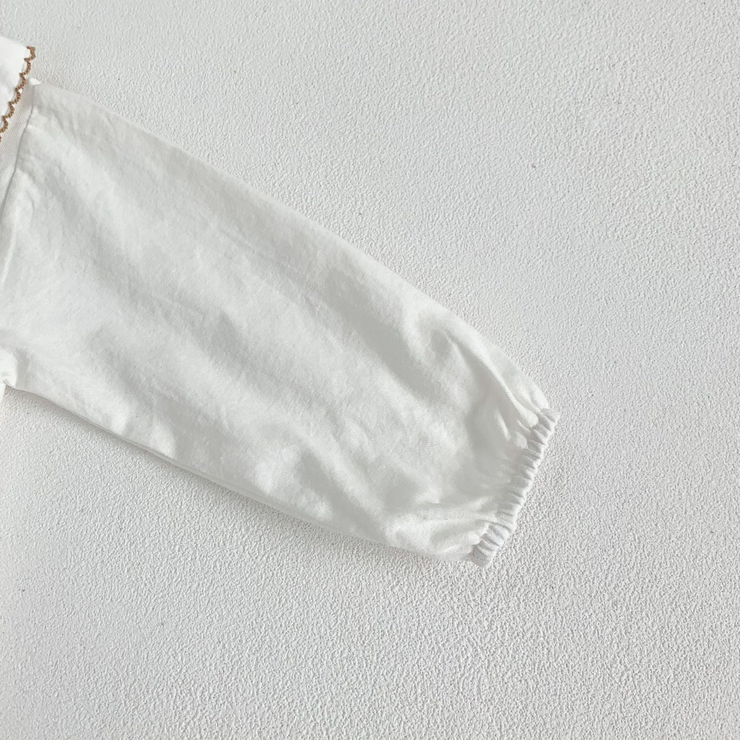 Embroidered Lapel Collar Onesie